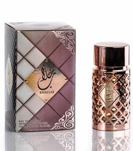 تحميل الصورة إلى عارض المعرض، Perfume bottle and packaging of Jazzab Ard Al zaafaran by Lattafa