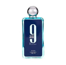 Load image into Gallery viewer, 9 AM Dive by Afnan featuring lemon, mint, black currant, incense, ginger, sandalwood, and patchouli notes in an elegant perfume bottle.

